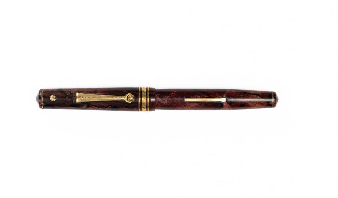 Wahl Eversharp Equi-Poised Tunis Fountain Pen: Wahl Eversharp Equi-Poised Tunis marble fountain pen. Full size version in uncommon Tunis colour, some brassing to thin bands at top and bottom of pen, later lever, tight hairline crack at crown of ca