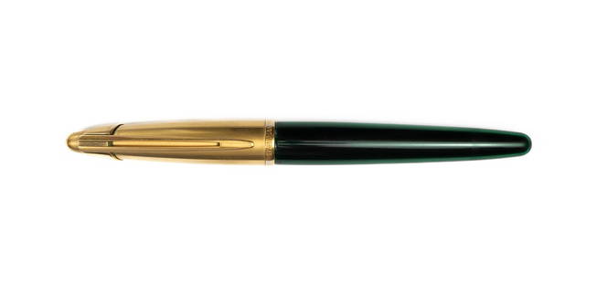 Waterman Edson Emerald Green Fountain Pen: Waterman Edson Emerald fountain pen. Edson model with classic late 1990’s retro-Art deco design, this example in Emerald with gold cap and medium 18K nib. Length 5 5/8” and 6 3/8” posted