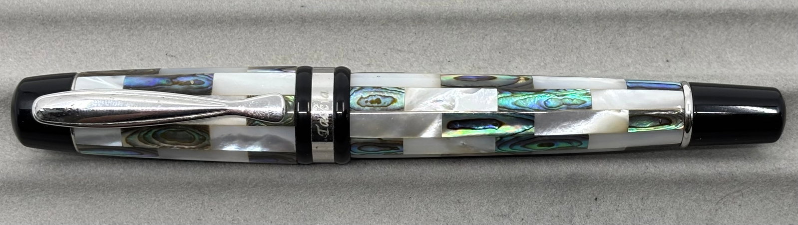 Taccia Oversized Mother of Pearl & Abalone Fountain Pen 18K Nib: Taccia decagon oversized mother of pearl and abalone fountain pen. Large oversized Taccia, decagon cap and barrel with alternating small slabs of mother of pearl and abalone style material with medium