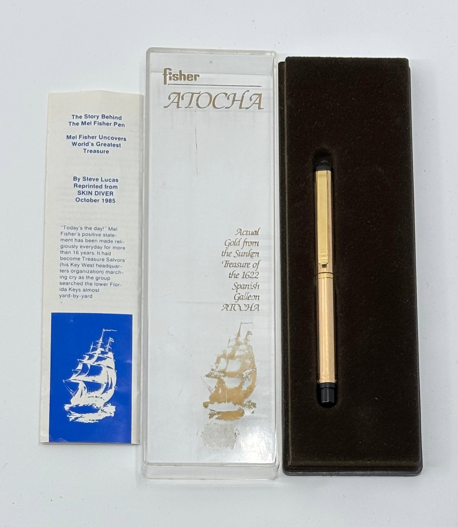 Fisher Space Pen Atocha 14K Gold Mel Fisher Pen, Boxed: Fisher Space Pen, Atocha 14K gold ballpoint pen, boxed. Mel Fisher in 1985 with his team discovered the wreck of the Atocha, a Spanish galleon that sunk in 1622. This Fisher Space Pen marked 14K on ba