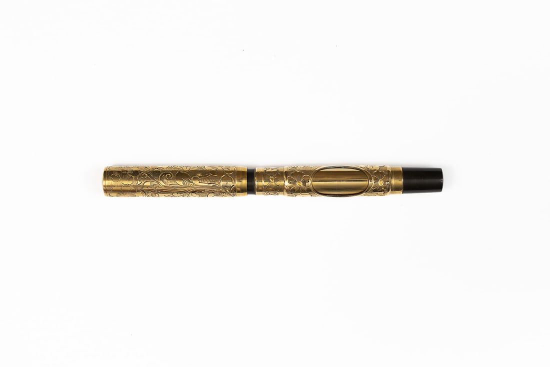 Aikin Lambert 4 Sleeve Filler Gold Pansy Panel Fountain Pen: Aikin Lambert gold filled pansy panel pattern sleeve filler fountain pen. Similar to Waterman examples, this gold filled over black hard rubber sleeve filler fountain pen with pansy panel pattern, Aik