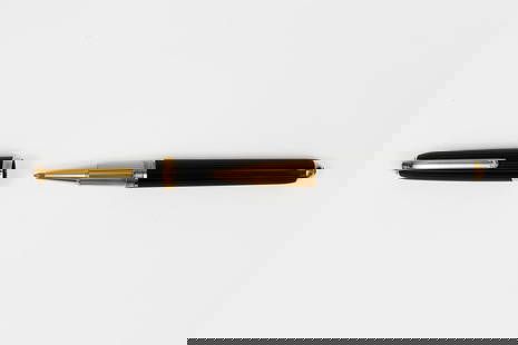 Louis Cartier Black Composite & Gold Rollerball Pen: Louis Cartier Black Composite and gold trim fountain pen, boxed. Fluted Cartier rollerball pen in Black Composite with gold clip, band, section and ends. Length 5 5/8&rdquo; and 6 5/8&rdquo; posted. O