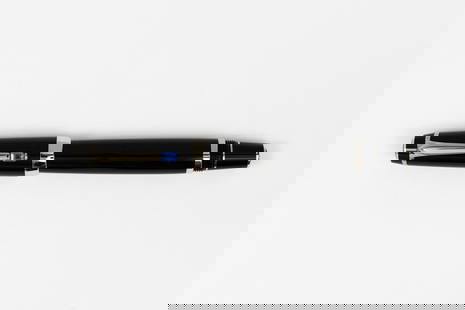 Montblanc Boheme Sapphire Platinum Plate Rollerball Pen: Montblanc Boheme Sapphire jewel platinum trim rollerball pen, circa 2000. Platinum plate trim with blue sapphire jewel, threaded end on rollerball for cap to post. Length 4 7/8“ and 5 5/8“ posted.