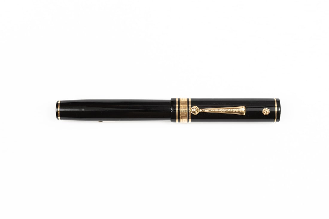 Wahl Eversharp Oversized Deco Band Jet Black Fountain Pen: Wahl Eversharp oversized deco band jet black fountain pen, circa 1920’s. Gold seal oversized deco Grecian cap band with Wahl Eversharp Gold Seal Signature 14K fine nib. Length 5 3/8” and 7&rdq