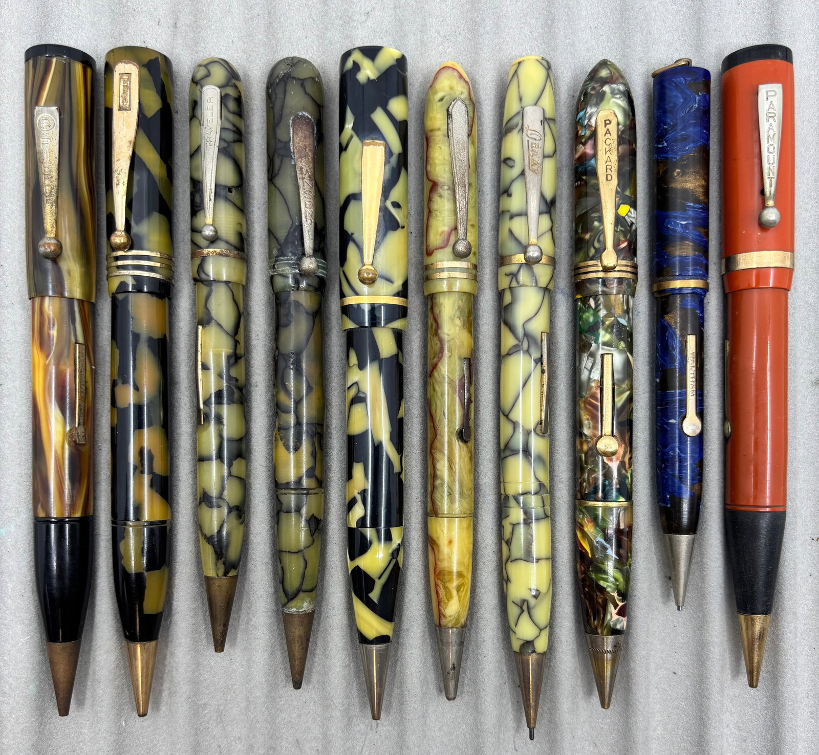 Assorted Celluloid Fountain Pen/Pencil Combos (10) Lot J, 14K Nibs: Assorted celluloid fountain pen/pencil combinations (10). Brands include Dandy, Packard, Paramount, Pierce, Salz, Townsend, Traveller, Waltham and unmarked (2). All pens have 14K nibs, some pens with