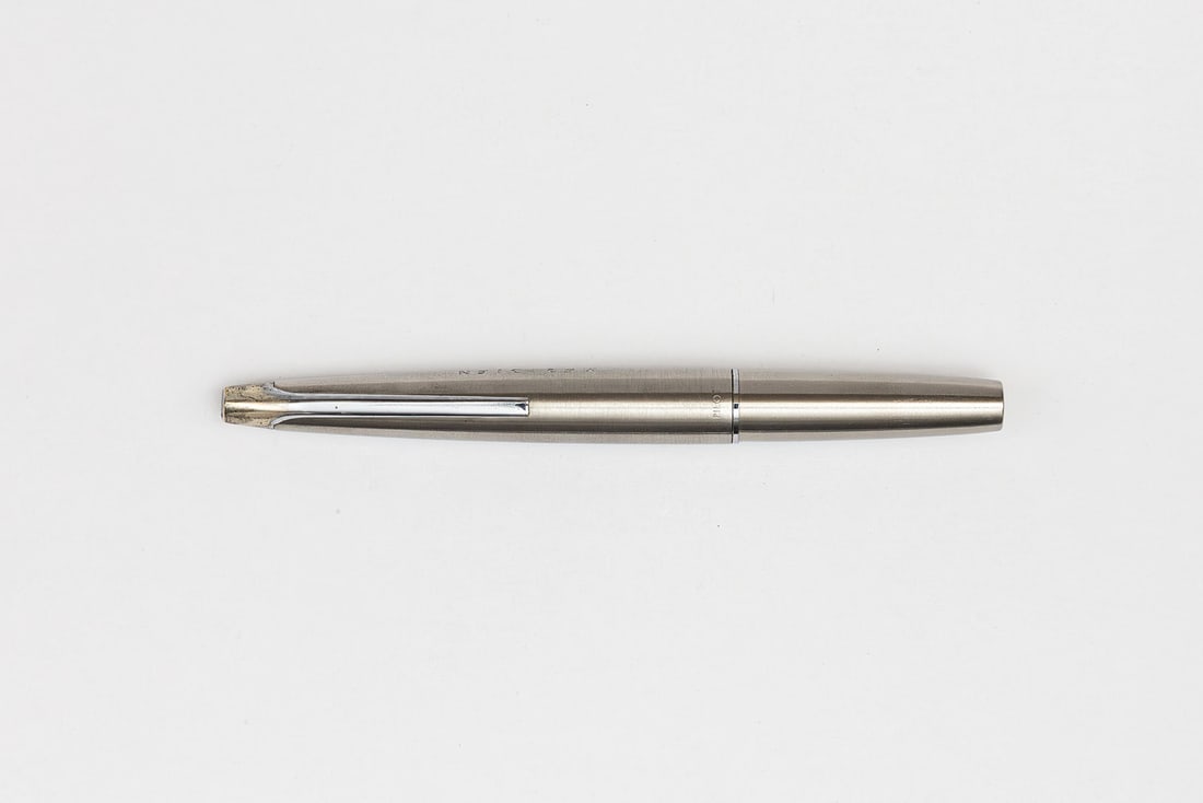 Pilot MYU 701 Stainless Steel Fountain Pen: Pilot MYU 701 stainless steel fountain pen, circa 1974. Pilot MYU 701 in stainless steel with fine nib dating to June, 1974. Cap engraved Meridien and barrel engraved with two Japanese characters. Len