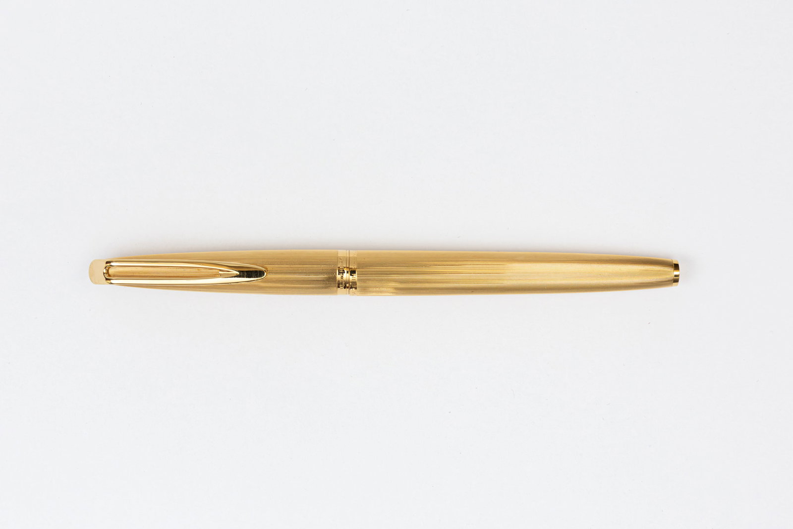 Waterman CF Millerais Gold Fountain Pen, Boxed: Waterman CF Millerais gold filled fountain pen with original box, circa 1970’s. Waterman CF with vertical lined pattern and 18K fine nib. Length 5 3/8” and 5 7/8” posted, filling mechani