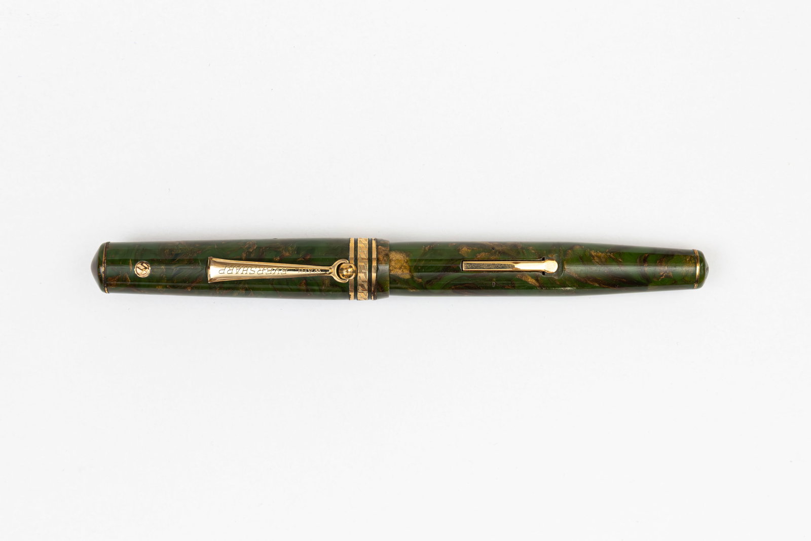 Wahl Eversharp Equi-Poised Standard Size Brazilian Green Fountain Pen: Wahl Eversharp Equi-Poised fountain pen in Brazilian Green. Full size model with roller clip and rhomboid band, Gold Seal on cap with Gold Seal manifold 14K medium nib. Length 5 5/16” and 6 1/4&
