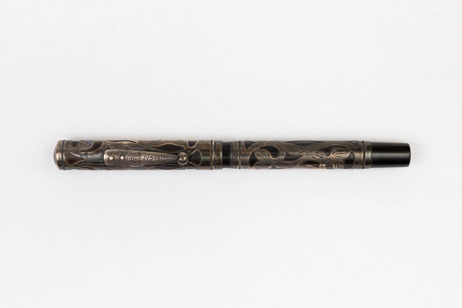 Waterman 415 Sterling Silver Trefoil Filigree Fountain Pen: Waterman Ideal 415 sterling silver filigree fountain pen. Slip cap model in Trefoil pattern sterling silver filigree over black hard rubber with sterling clip. Minor marks to cap crown, some discolour