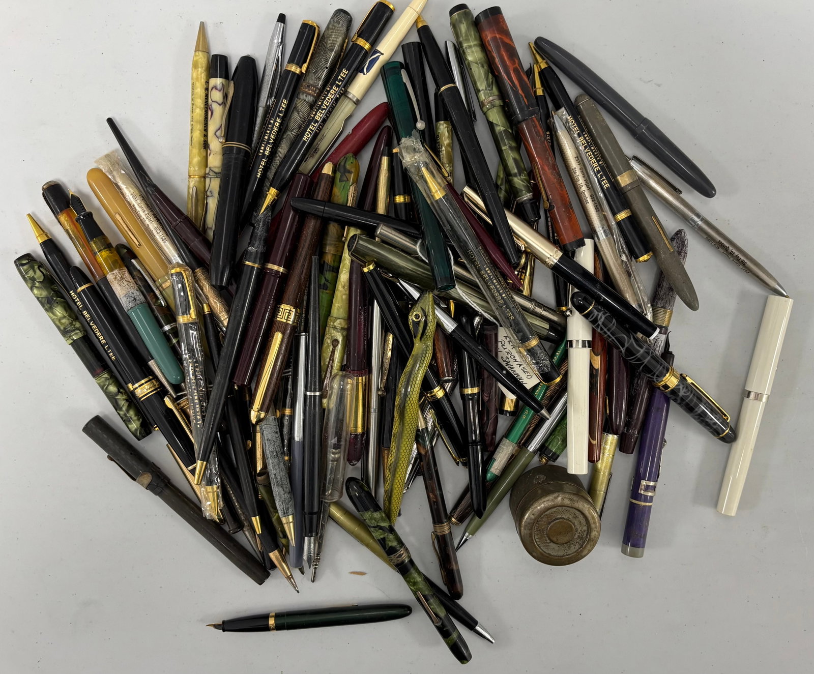 Assorted Mixed Fountain Pens, Pencils and Ballpoint Lot: Assorted group of pens and pencils along with traveling inkwell, over 50 pieces. Overall mixed as is condition.