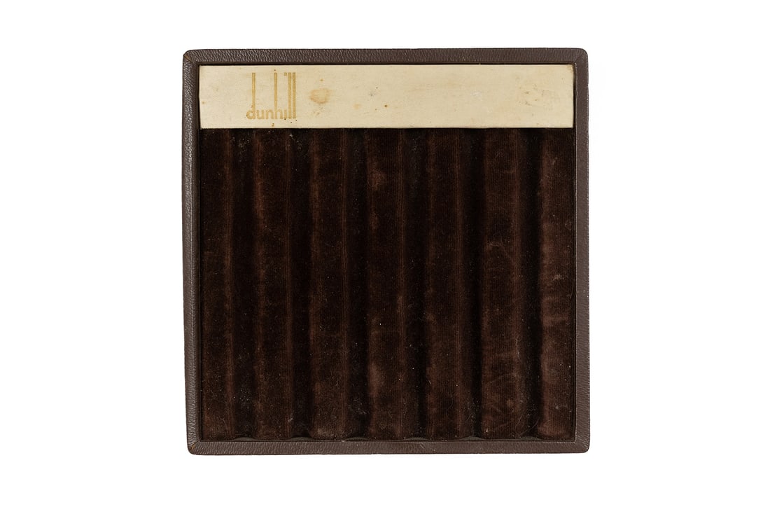 Dunhill Fountain Pen 6 Slot Original Tray: Dunhill fountain pen 6 slot tray, made in France. Brown with while, easel style back to sit on angle. Overall fair condition with some staining and marks, 7” square.