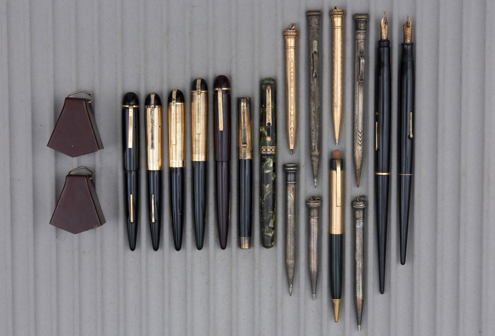 Wahl Eversharp Assorted Fountain Pens, Pencils and Tools (19): Wahl Eversharp pieces (19). 9 fountain pens all with 14K nibs (Doric with Waterman nib), 8 pencils and two Wahl Eversharp Personal Point nib holders. Overall mixed as is condition.