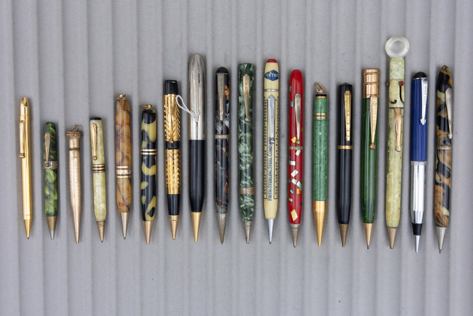 Assorted Marbleized Mechanical Pencils (18): Assorted mechanical pencils (18). Mixed lot of mechanical pencils. Overall mixed as is condition.