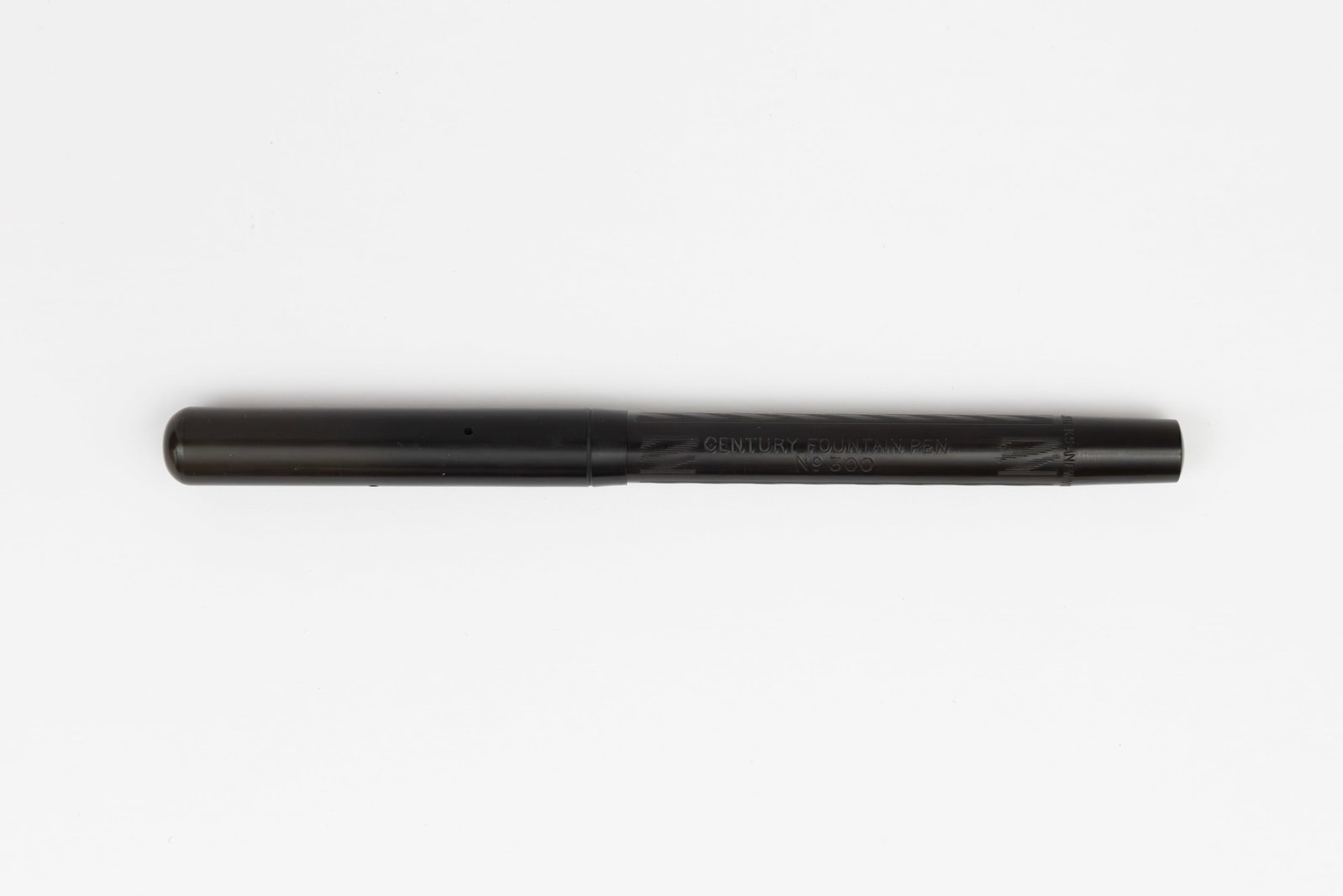 WS Hicks Century 300 Black Chased Hard Rubber Fountain Pen: WS Hicks model Century 300 fountain pen. Hicks made pens and pencils in gold and silver made overlays for some of the largest pen manufacturers of their time as well as jewellers such as Cartier and T