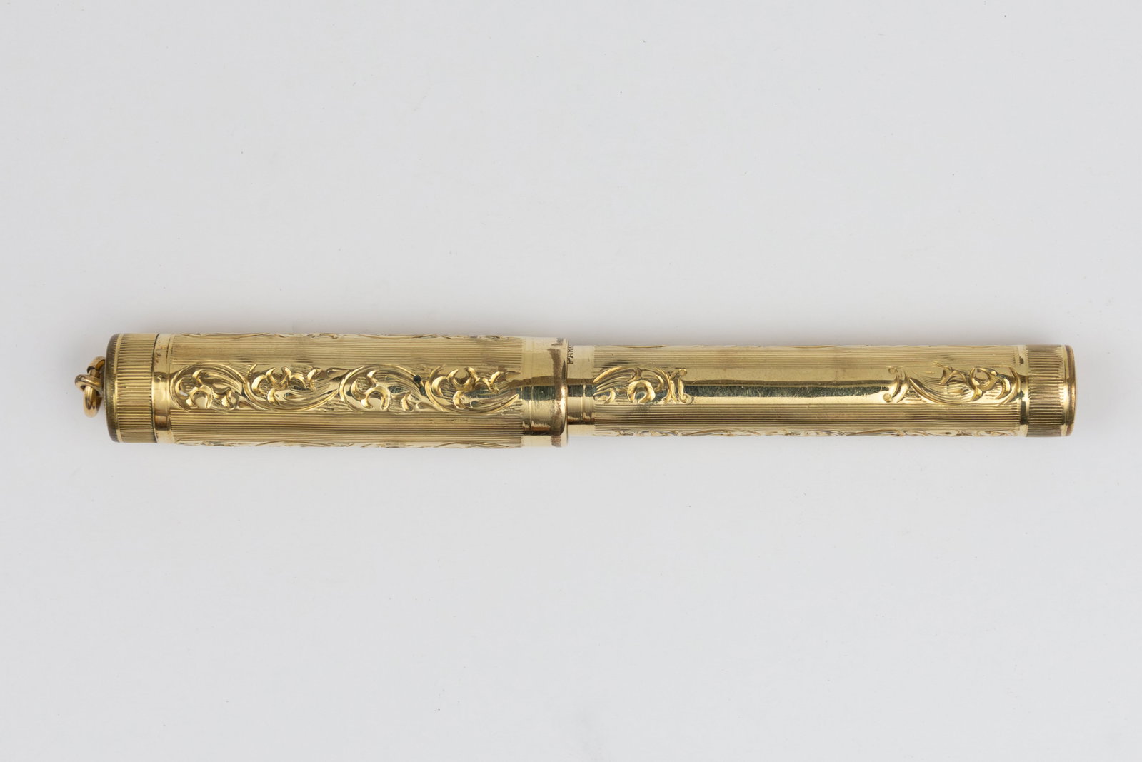 Parker Lucky Curve 205 Gold Filled Ring Top Fountain Pen: Parker Lucky Curve 205 yellow gold plate fountain pen with scrollwork pattern. These Parkers appear to have been introduced in the 1921 catalog, they were made in solid gold, sterling and gold filled 