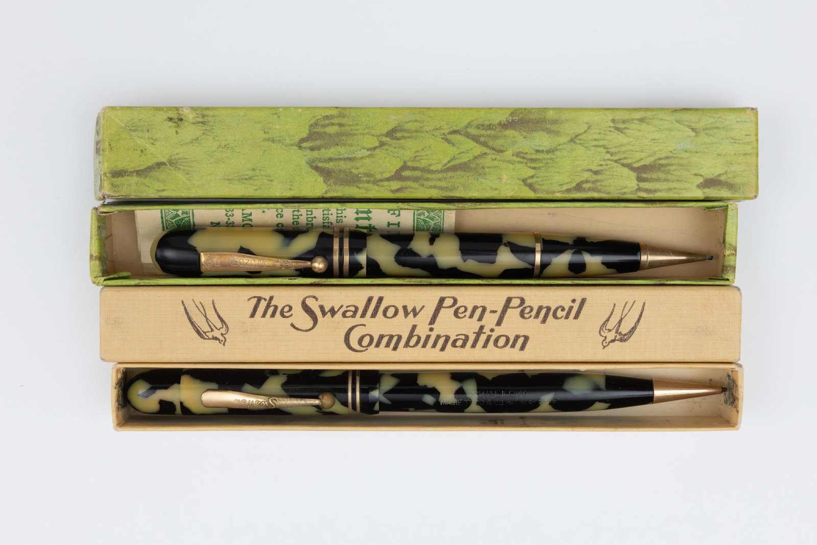 Mabie Todd Swan Swallow and Diamond Point Fountain Pen Combos: Mabie Todd Swan Swallow and Diamond Point black and pearl fountain pen and pencil combinations, boxed. Diamond Point and Swallow combos in black and pearl with original boxes, both with 14K nibs.
