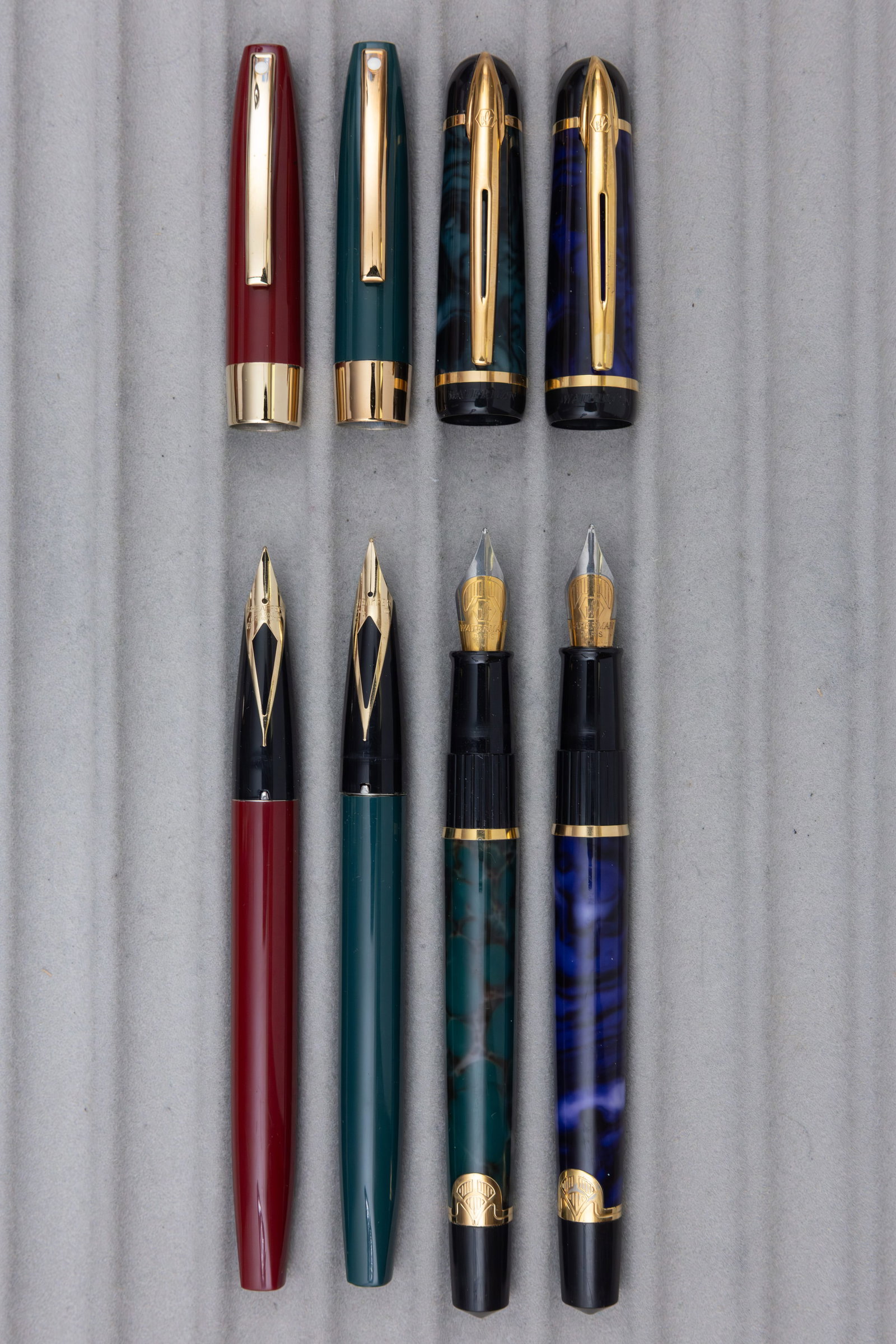 Sheaffer Imperial and Waterman Phileas Fountain Pens (4): Sheaffer Imperial and Waterman Phileas fountain pens. Sheaffer and Waterman cartridge/converter pens (Sheaffer converters present, Waterman converters absent), together with three pen boxes. Overall g