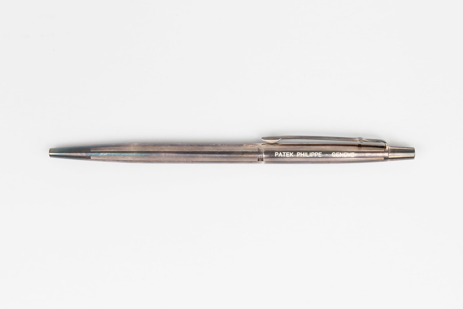 Caran dAche Madison Silver Patek Philippe Ballpoint Pen: Caran dAche Madison silver Patek Philippe - Geneve ballpoint pen. Silver Madison ballpoint pen engraved Patek-Philippe - Geneva on side of cap. Length 5 3/8 inches. Overall excellent condition,