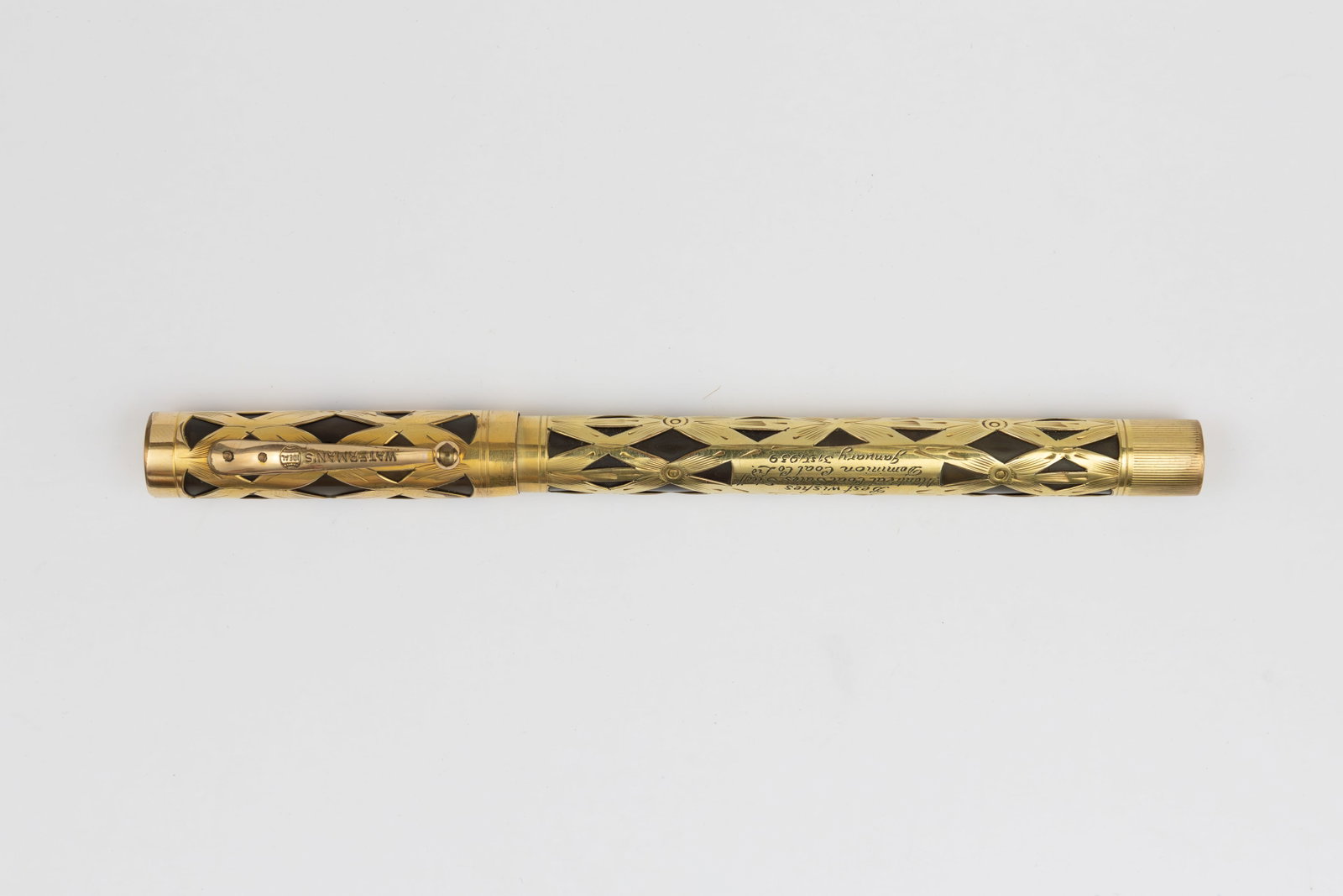 Waterman 0552 1/2 LEC Gold Filled Filigree Fountain Pen: Waterman 0552 1/2 LEC (lower end covered) gold filled filigree fountain pen. Later Trefoil pattern gold filled filigree with 14K Waterman Ideal 2 fine flexible nib. Length 5 1/8 inches and 6 3/8