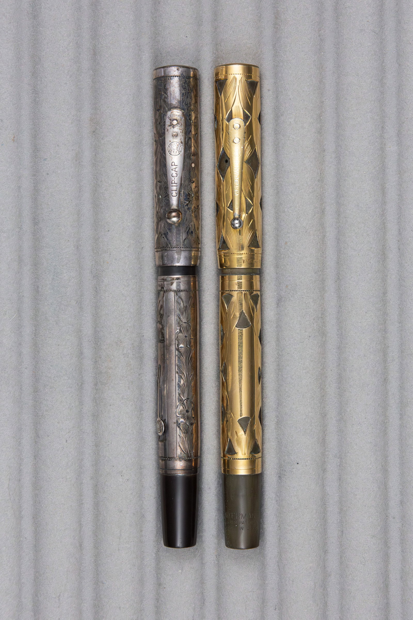 Waterman 0552 and 452 Gold and Sterling Silver Overlay Fountain Pens: Waterman Ideal 0552 and 452 fountain pens, circa 1920s. Gold filled Trefoil pattern filigree 0552 with fine flexible Waterman 14K nib along with sterling silver Pansy pattern overlay 452 with fine fle