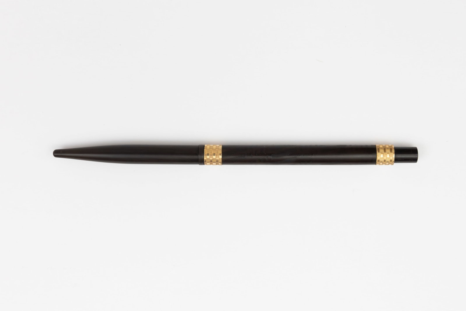 Century Taper Cap Black Chased Hard Rubber Fountain Pen: Century taper cap black chased hard rubber fountain pen with gold decorative bands, circa 1910’s. Century Pen Company of Whitewater, Wisconsin were just 20 miles down the road from Janesville,