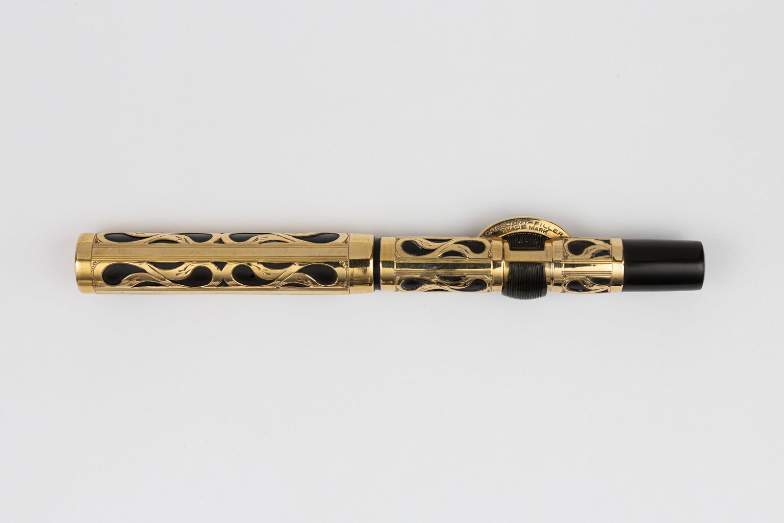 Conklin Crescent Filler Gold Filled Filigree 5 Size Fountain Pen: Conklin Crescent Filler gold filled filigree fountain pen. Large 5 size model with gold overlay in vertical lined pattern followed by filigree pattern with large Conklin Toledo 5 14K fine flexible nib