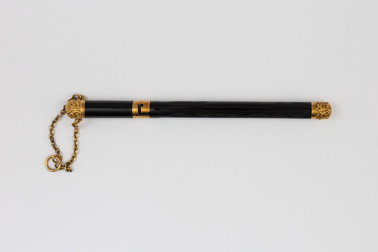 Mabie Todd Swan Chatelain Black Chased Hard Rubber Fountain Pen: Mabie Todd Swan chatelain black chased hard rubber fountain pen. Early chatelain pen with gold filled decoration on top and bottom and gold filled cap band, British design registration number imprinte