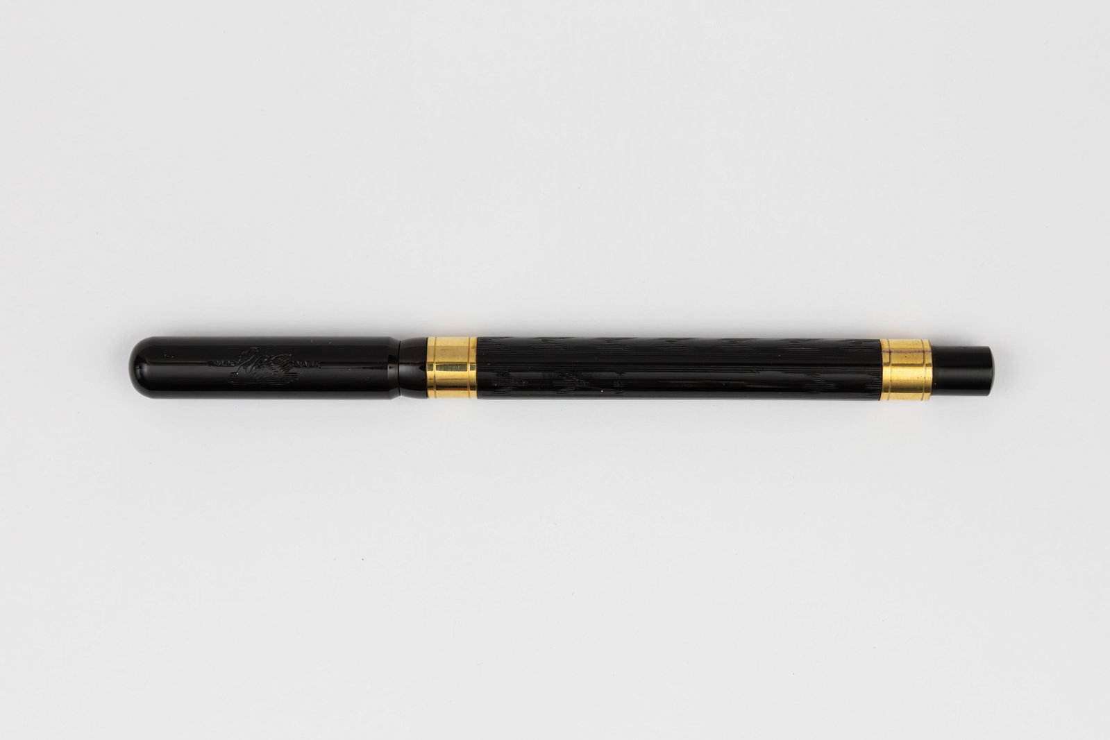 Mabie Todd Swan 4222 Black Chased Hard Rubber Fountain Pen, Boxed: Mabie Todd Swan 4222 black chased hard rubber fountain pen, boxed, circa 1910’s. Early over/under feed black chased hard rubber model with gold filled barrel bands, marked 4222 near base, Mabie Todd