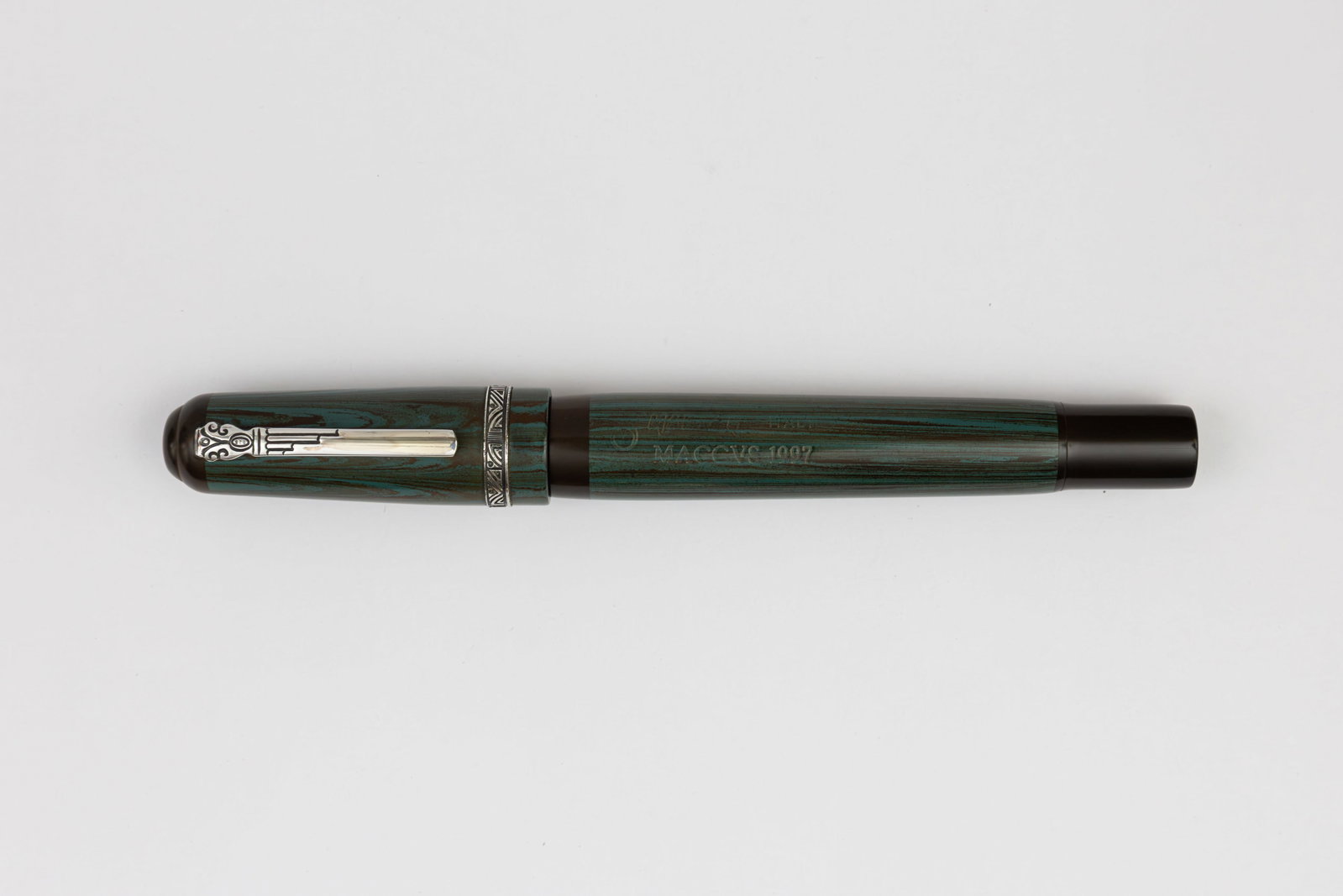 Marlen Magnum MACCVS Blue/Black Hard Rubber Fountain Pen: Marlen Magnum MACCVS mottled hard rubber fountain pen, circa 1997. Marlen produced four pens to represent the four masks used in the Atellan Tales of Italian theatre, this being Maccus and the magnum 