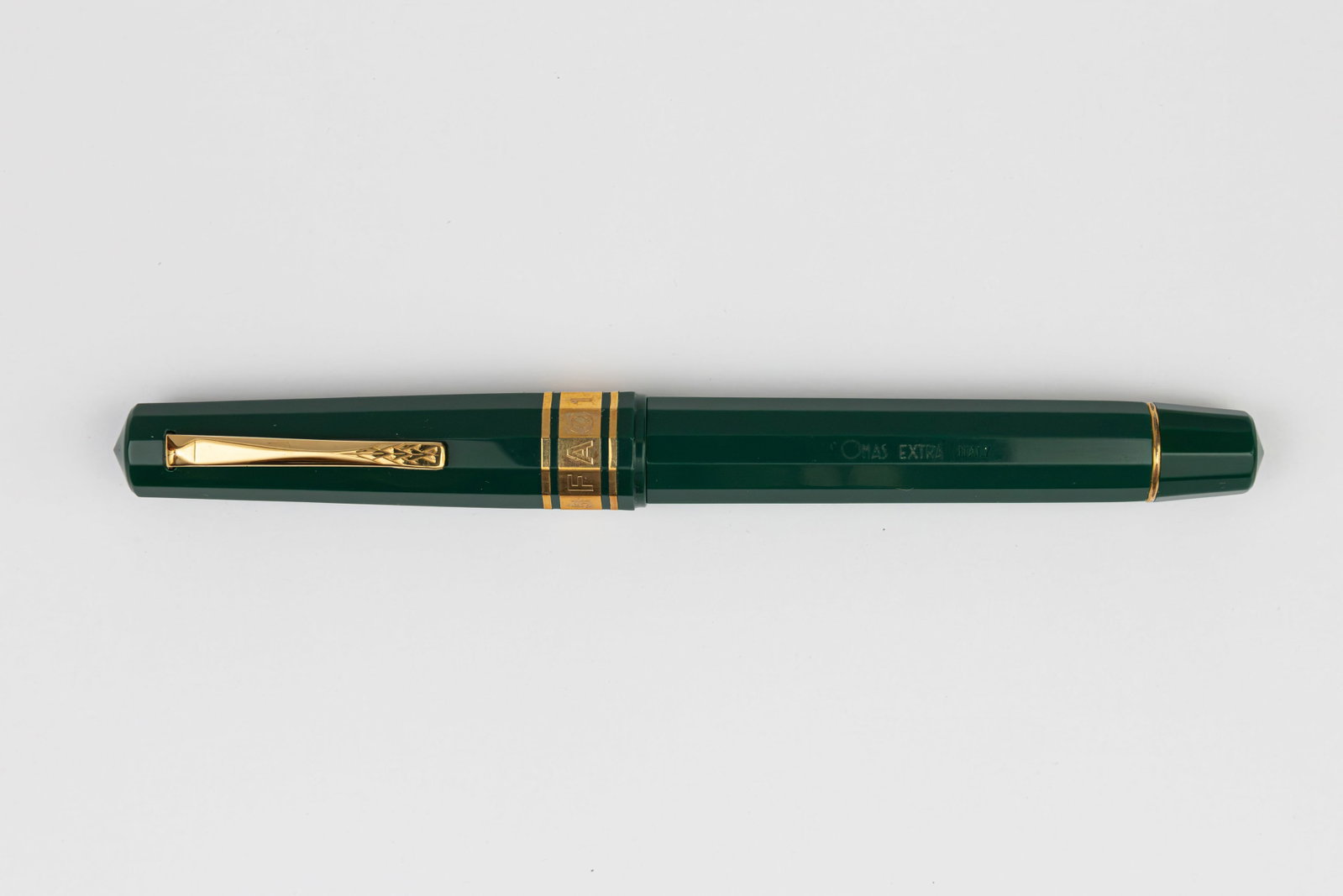 Omas FAO 50th Anniversary Paragon Fountain Pen, Boxed: Omas FAO Food and Agricultural Organization of the United Nations fountain pen with box, marbled case and papers, circa 1995. Omas FAO Paragon pen in green with Omas FAO medium 18K nib. Length 5 5/8&r