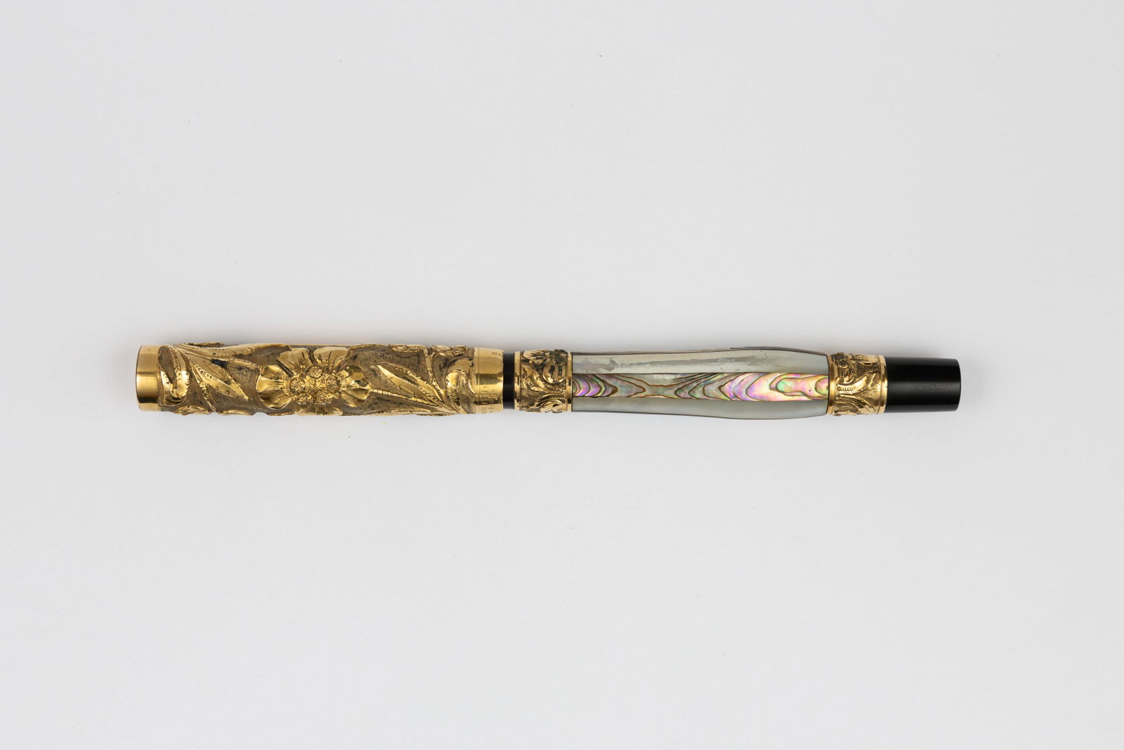 Parker 47 Alternating Abalone, Pearl Slab Pregnant Parker Fountain Pen: Parker Lucky Curve 47 abalone and mother of pearl alternating slab “Pregnant Parker” fountain pen with relief floral gold cap. One of the better known Parker overlays, the 47, often referred t