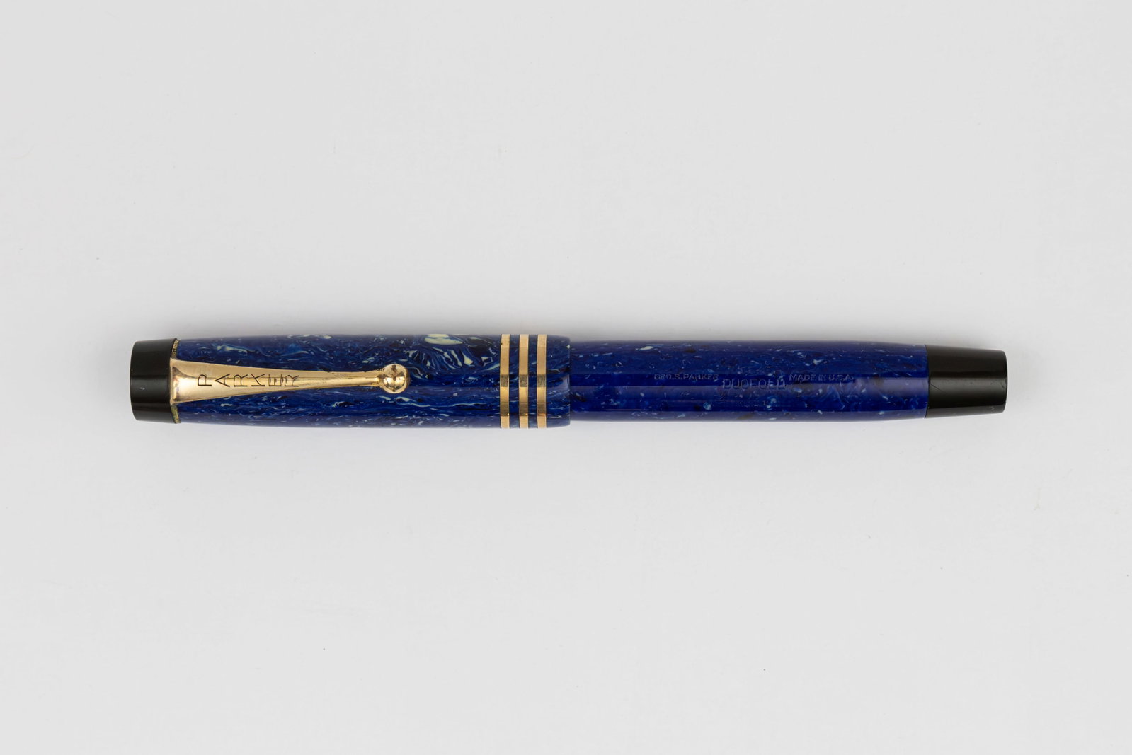 Parker Duofold Streamline Juniorette Lapis Lazuli Blue Fountain Pen: Parker Duofold streamline Juniorette Lapis Lazuli Blue fountain pen, circa 1929-31. Streamlined Juniorette triple cap band fountain pen in Lapis Lauzli with Parker Duofold 14K extra fine nib and Lucky