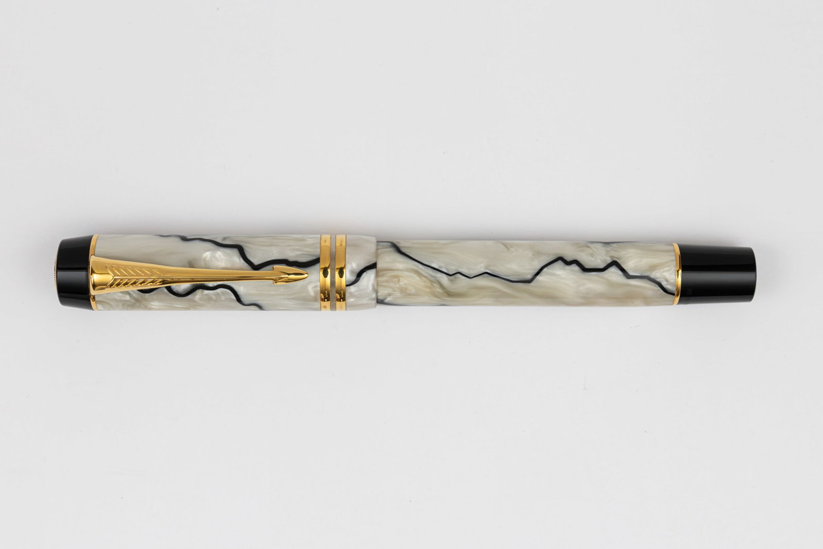 Parker Duofold Centennial Black & Pearl Fountain Pen, Fine Italic Nib: Parker Duofold Centennial Black and Pearl fountain pen, circa 1996. The Duofold reappeared in a new form in 1987, incorporating some of the styling from the 1920’s flattop pens with modern acrylics 