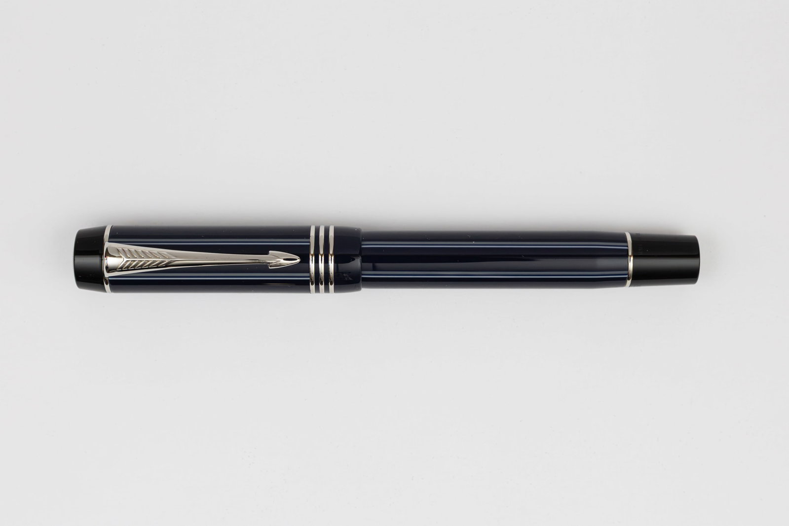 Parker Duofold Centennial Navy Pinstripe SE Fountain Pen, Boxed: Parker Duofold Centennial Navy Pinstripe special edition fountain pen, with box, outer box and papers, circa 2004. The Duofold reappeared in a new form in 1987, incorporating some of the styling from 