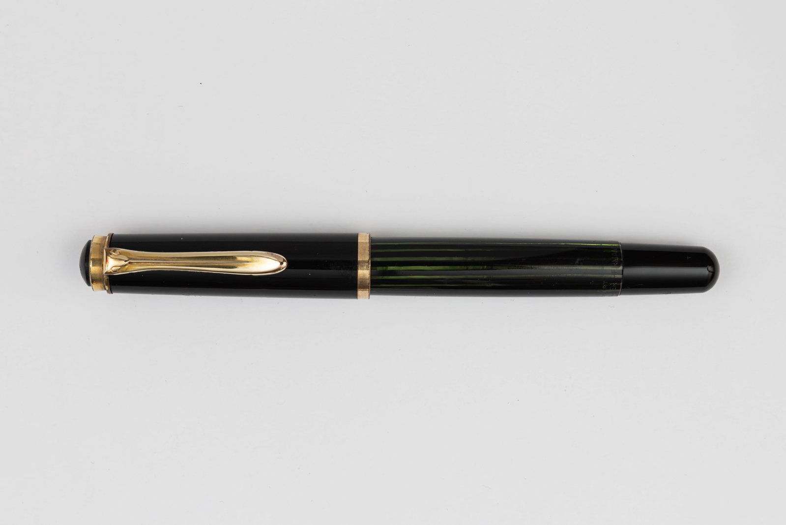 Pelikan 400N Black Export Model Fountain Pen: Pelikan 400N black striated fountain pen, circa 1956. The 400N is similar to the 400 but with a slightly rounder top cap and rounded bottom, it was only made for 1-2 years and therefore far less commo