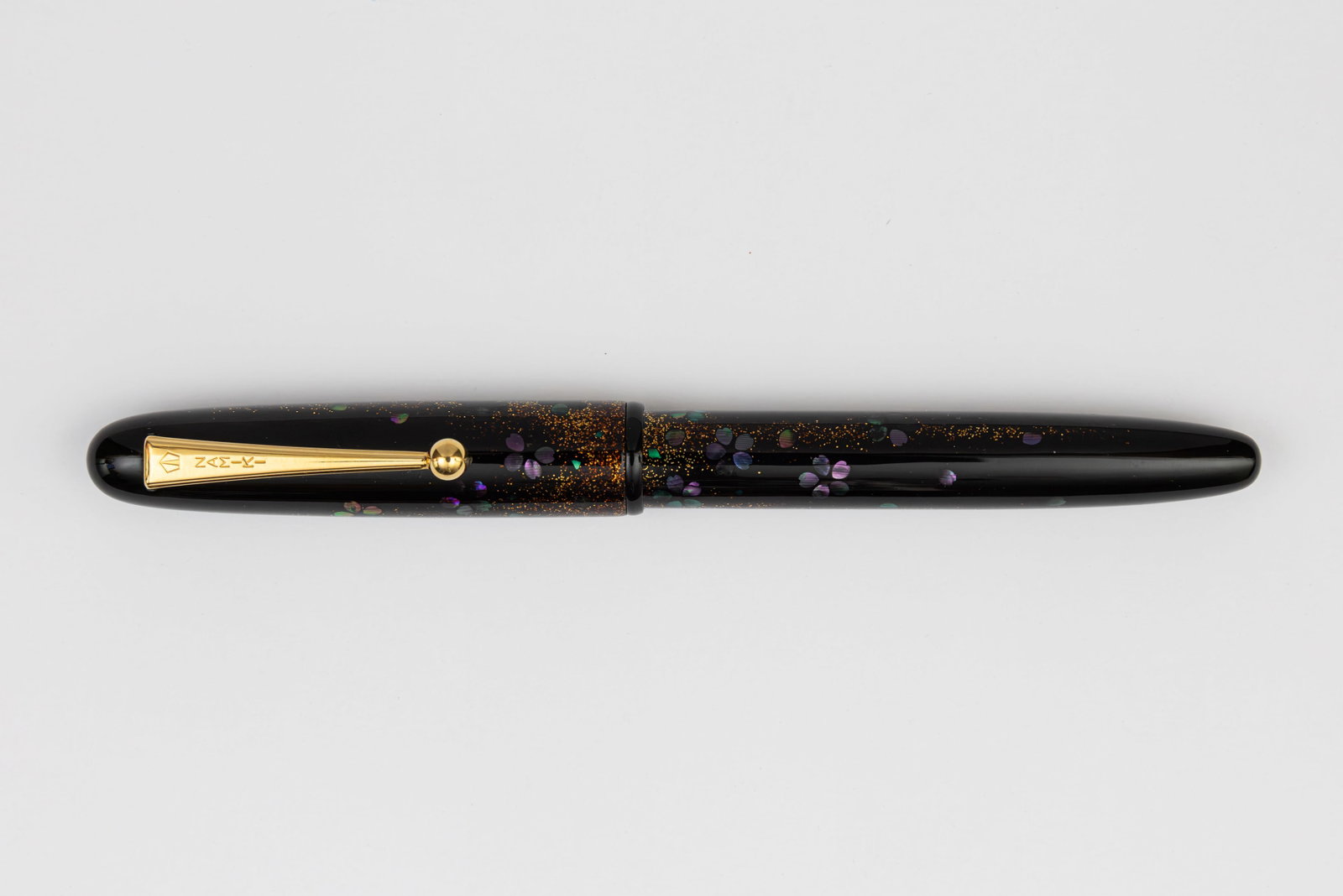 Pilot Namiki Yukari Yozakura Raden Cherry Blossoms at Night Fountain Pen: Pilot Namiki Yukari Yozakura Raden (Cherry Blossoms at Night) fountain pen by Yumi Hayashi, circa 2005. Yumi Hayashi is known as being the first woman mak-e artist to be hired by Namiki. She has compl