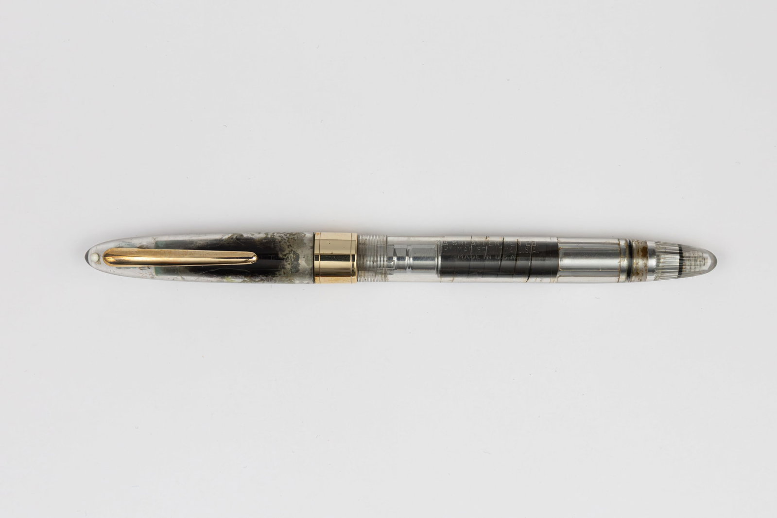 Sheaffer Snorkel 1st Year Demonstrator Fountain Pen: Sheaffer Snorkel 1st year demonstrator fountain pen. The Sheaffer Snorkel was possibly Sheaffer’s last truly unique filling system, one could fill the pen by twisting the end knob to extend a tube (