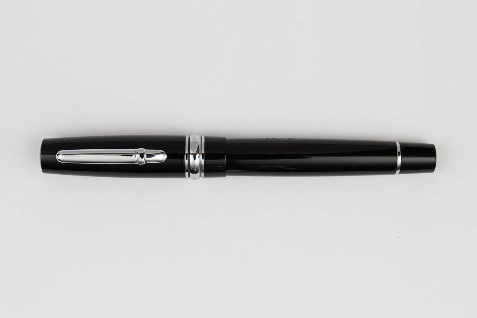 Stipula Novecento Ebano LE Fountain Pen, 18K Stub Nib: Stipula Novecento Ebano limited edition fountain pen. Stipula Novecento black acrylic pen, limited edition of unknown number (4084). Larger model in the line with silver trim and rhodium plated 18K 1.
