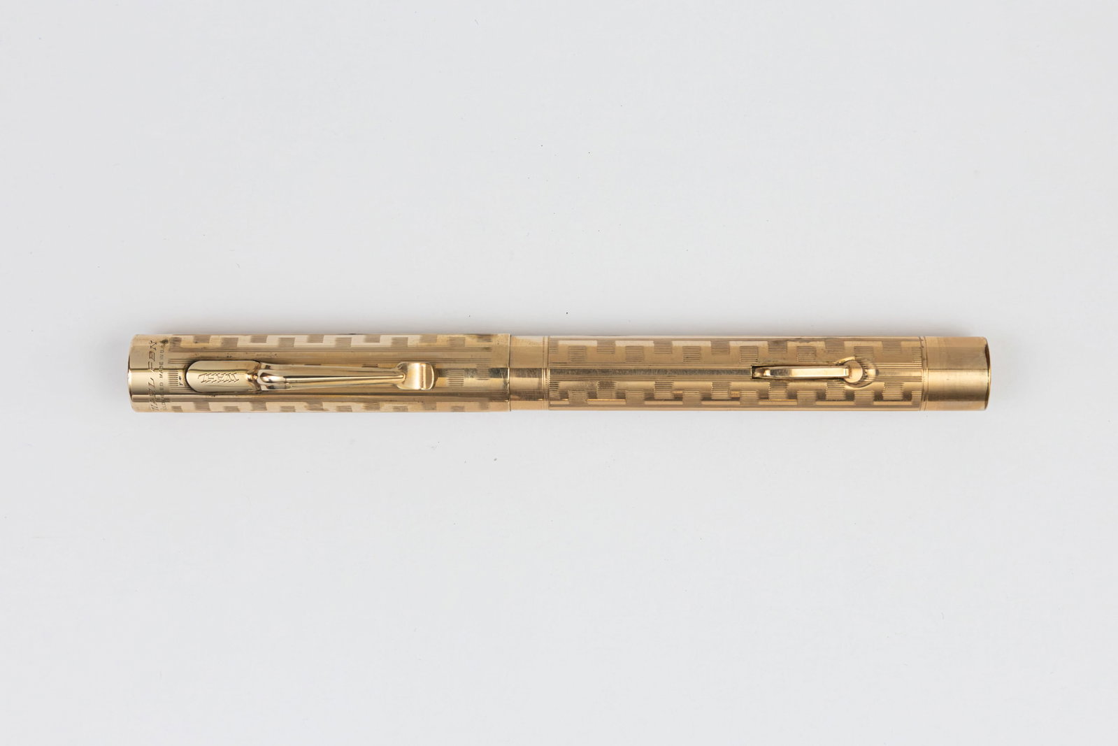 Wahl Eversharp Grecian Border 5 Size Fountain Pen: Wahl Eversharp Grecian Border gold filled fountain pen, circa 1920’s. Large 5 size model in Grecian Border pattern with Wahl Pen 5 14K fine flexible nib. Length 4 7/8” and 6 1/2” posted,