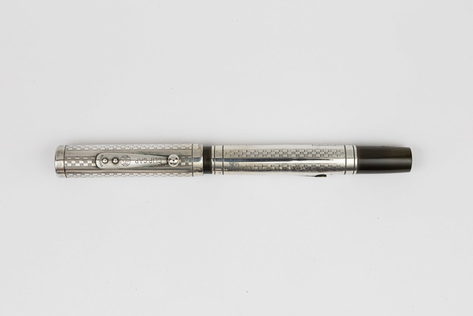 Waterman 452 Gothic Sterling Silver Overlay Fountain Pen: Waterman Ideal 452 Gothic sterling silver overlay fountain pen, circa 1920’s. Gothic pattern sterling silver overlay over black hard rubber with sterling clip, overlay with minor marks and small den