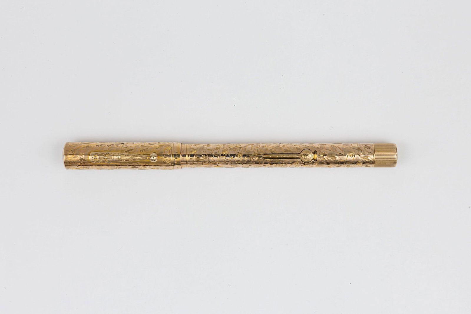 Waterman 552 1/2 LEC Hand Engraved Vine Solid 14K Gold Fountain Pen: Waterman 552 1/2 LEC Hand Engraved Vine solid 14K gold overlay fountain pen, circa 1920’s. Solid 14K gold overlay in Hand Engraved Vine pattern which carries throughout including on clip and lever. 