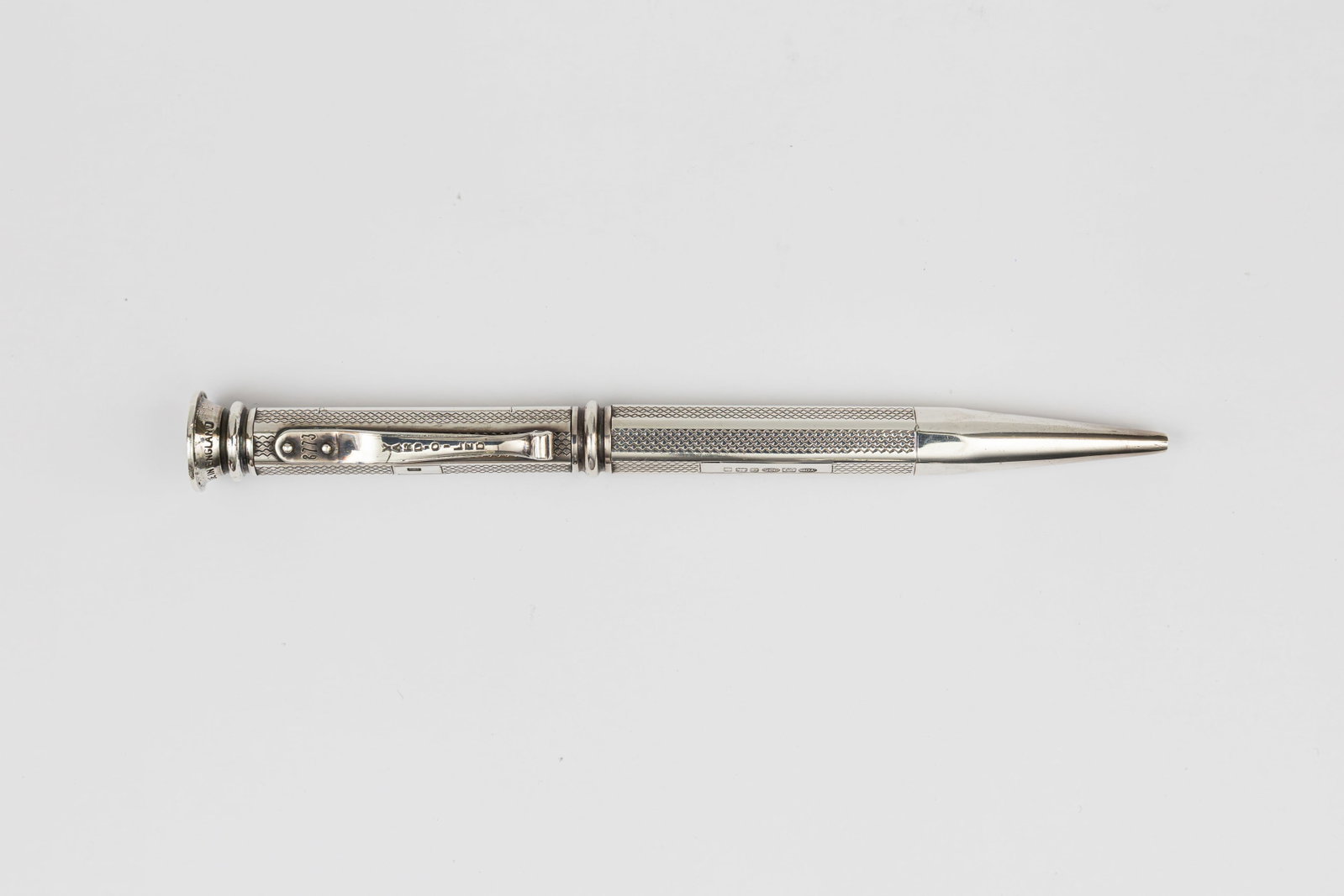 Yard-O-Led Regent Sterling Silver Ballpoint Pen: Yard-O-Led Regent sterling silver ballpoint pen. Regent model with flared top and barleycorn pattern on faceted barrel, sterling silver hallmarks on cap and barrel with unit numbers stamped on clip. L