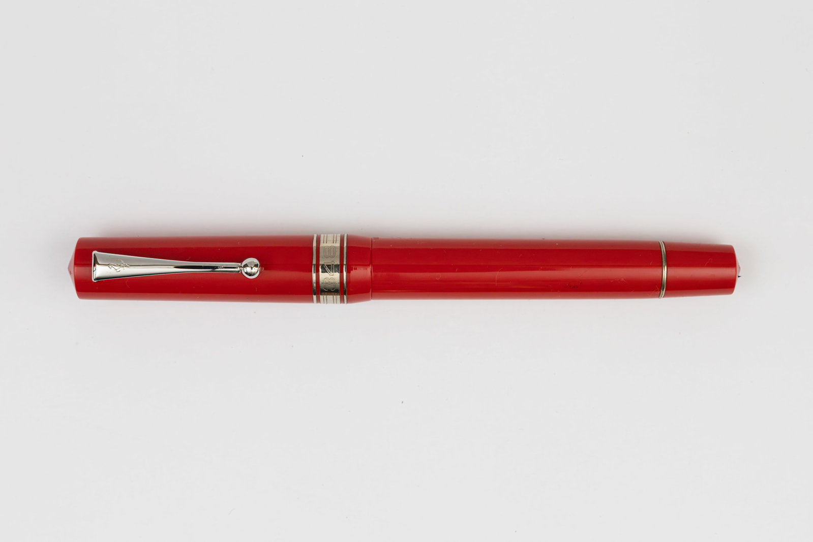 Omas Ferrari 348 Challenge Fountain Pen, Flawed: Omas Ferrari 348 Challenge fountain pen with box, decorative case and papers.Omas Ferrari 348 Challenge fountain pen with decorative aluminum tube that resembles a Ferrari automotive torsion strut or 