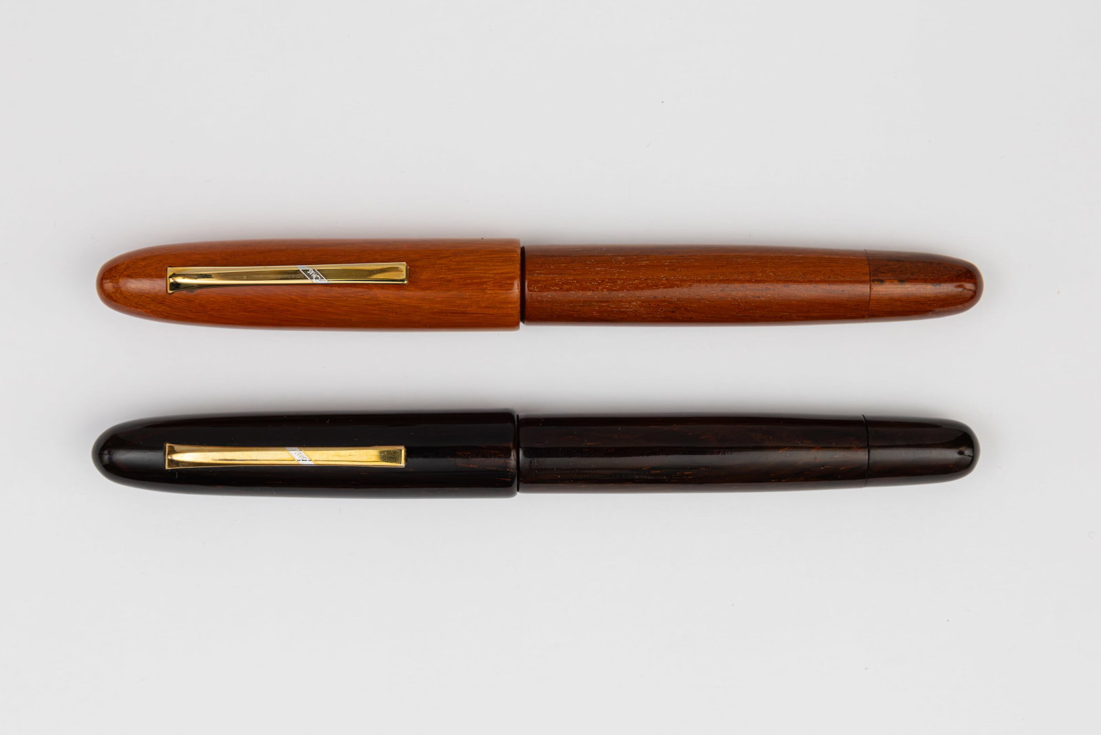 Omas Collezione Legni Pregiati Pernambuco & Violet Ebony Fountain Pens, Flawed: Omas Collezione Legni Pregiati fountain pens in Pernambuco and Violet Ebony. Omas made the Legni Pregiati line with 15 different precious wood fountain pens including 12 in Ogiva form and 3 in Paragon