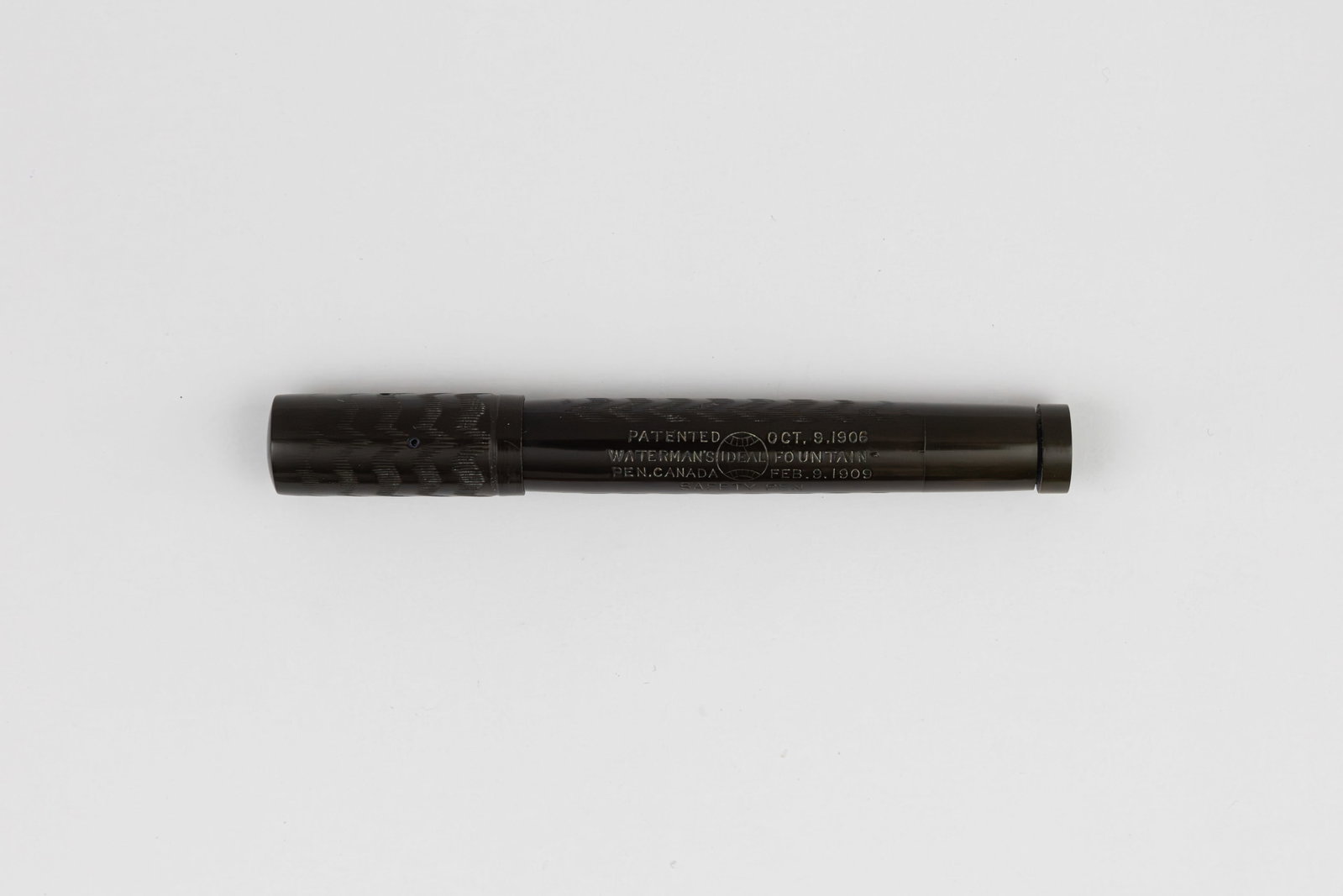 Waterman 42 1/2 V Safety Black Chased Hard Rubber Fountain Pen: Waterman 42 1/2 V safety black chased hard rubber fountain pen, circa 1915-1920. Black chased hard rubber with Waterman Ideal USA 2 fine 14K gold nib. Length 3 1/2” and 4 1/2” posted, fill