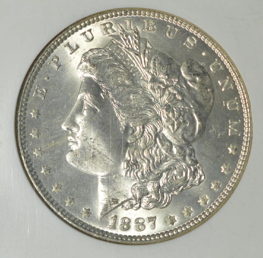 1887 Morgan Silver Dollar NGC MS 63 (1 of 3)