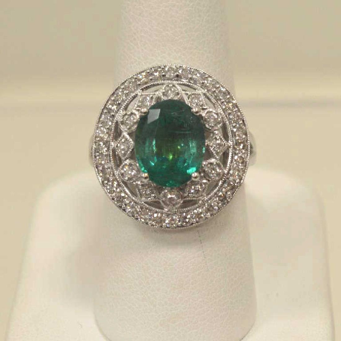 18kt white gold emerald and diamond ring (1 of 6)