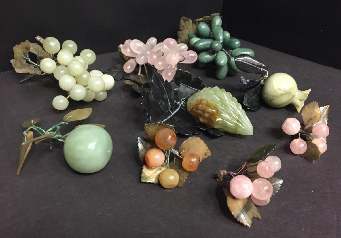 Group of carved stone decorative fruit (1 of 6)