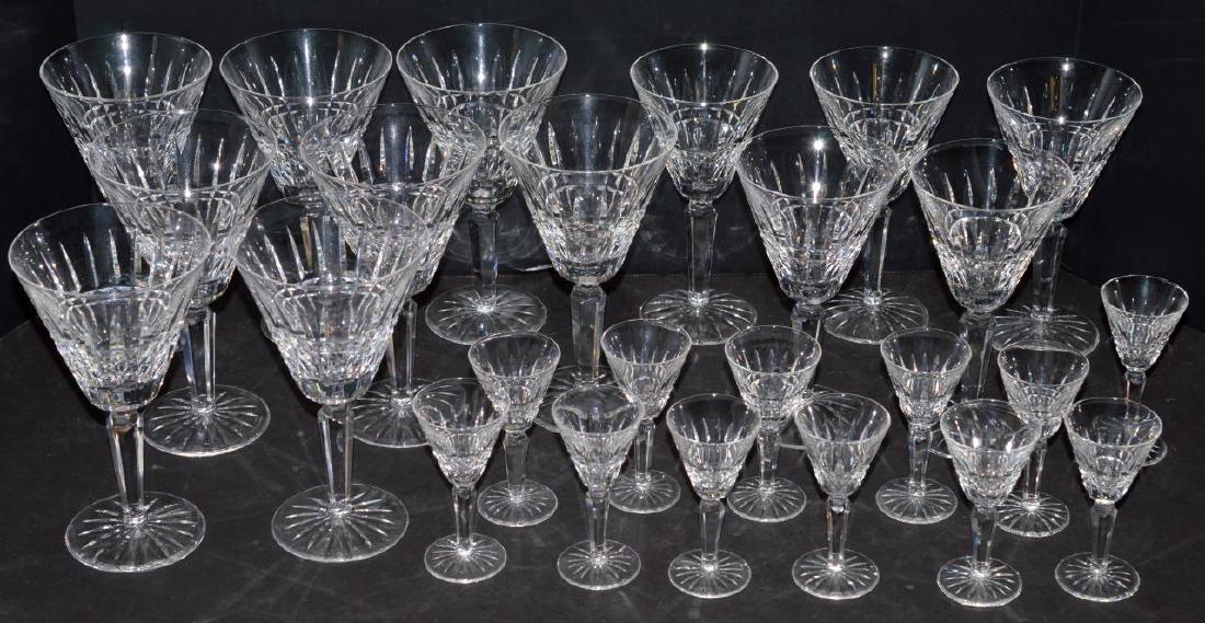 25 Waterford Cut Crystal Glenmore Stemware/Glasses: 25 Waterford Cut Crystal Glenmore Stemware. Includes: 5 Sherry Wine (5 1/2"h), 8 Claret Wine Goblet (6 1/2"h) & 12 Cordial Liqueur Cocktail (3 3/4"h) Stemmed Glasses. There is a rim chip on a wine gob