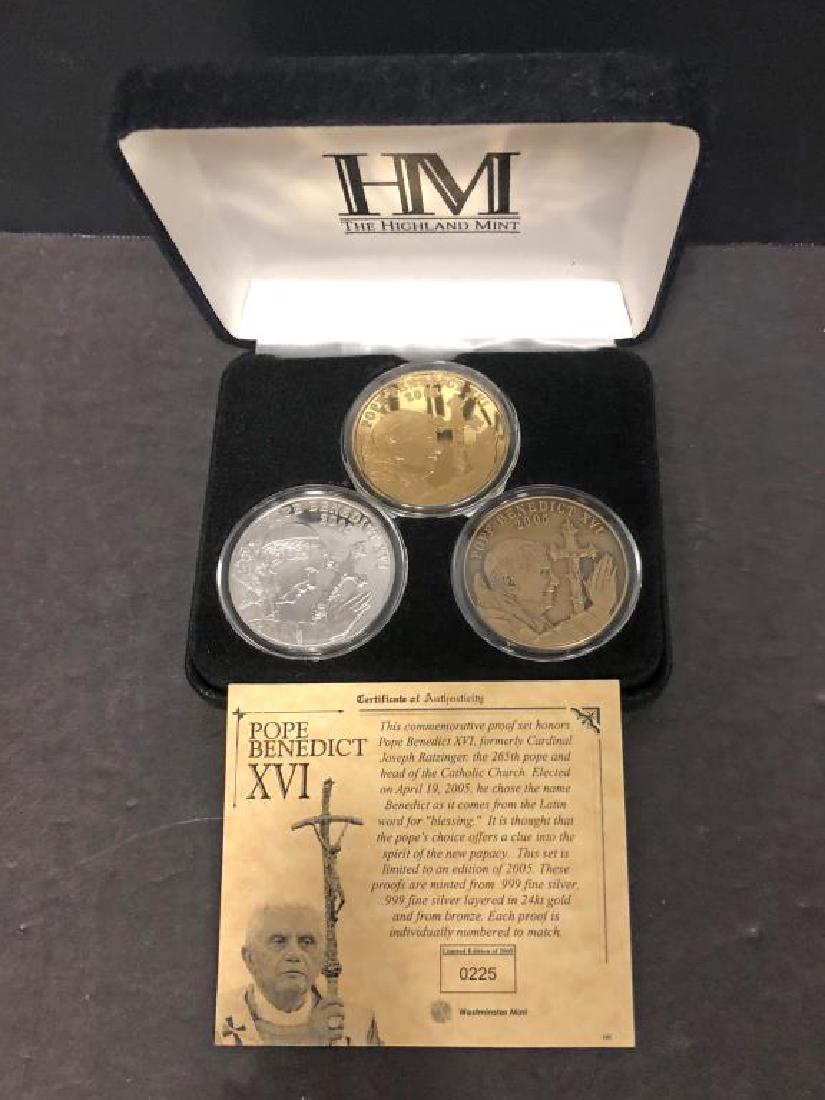 2005 Pope Benedict XVI Silver & Bronze Medal Set: 2005 Pope Benedict XVI Silver & Bronze Medal Set. This 3 medallion set has one made of .999 silver, one in gold layered .999 silver, and one in bronze. Comes with presentation case & COA.